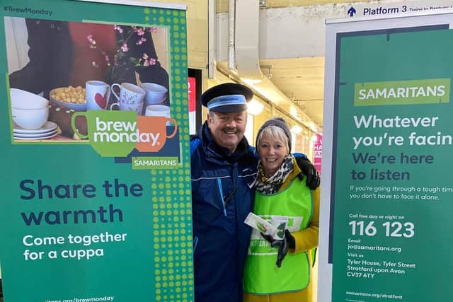 Samaritan volunteers with a member of British Rail staff at Leamington Railway Station. Photo supplied