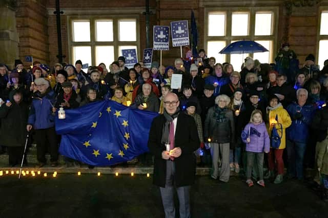 Warwick and Leamington MP Matt Western with the people gathered for the vigil outside Leamington Town Hall to mark the UK leaving the EU.