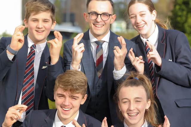 Arnold Lodge headteacher David Preston and pupils Olly Perkins, George Maddy, Maddy Whitehouse and Bethany Winchester, are all crossing their fingers ahead of Friday evenings TES awards at the Grosvenor House Hotel, in London