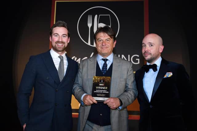 Oakman Inns CEO, Peter Borg-Neal (centre) receiving the award for Sustainable Operator of the Year 2020 at the Casual Dining Awards in London