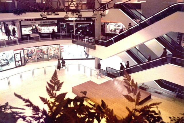 Our last picture shows a view from the top floor of St George's Centre in Preston city centre. The photo must have been taken early in the morning as this area was usually bustling with hundreds of shoppers. During refurbishment in 1981 the open-air rotunda was covered and the shopping centre reopened in 1982