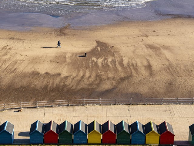 Whitby has beaches on both sides of the River Esk. On the east side is the smaller Tate Hill, a sheltered sandy beach that allows dogs all year round. On the other side of West Pier is West Cliff, a larger sandy beach with colourful beach huts