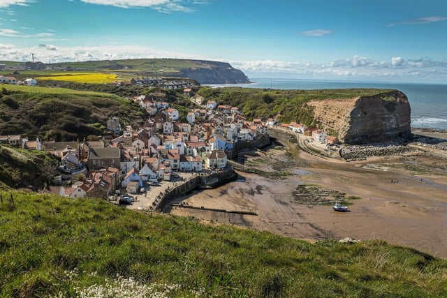 The eminently photographic fishing village of Staithes is reckoned by many to be the prettiest on the east coast. Sitting within the shelter of the harbour and backed by the seafront is a small sandy beach