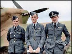 A rare colour picture of Newell Orton (right) at the airfield in France. Photo supplied