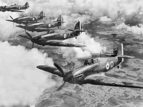 The 73rd Squadron on patrol over Reims. Newell Orton is flying the second Hurricane, marked 'J. Photo supplied