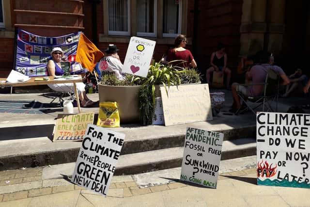 XR Warwick District members stage their protest outside Leamington Town Hall.