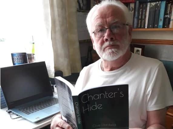 Clive Hardwick with his book Chanter's Hide. Photo submitted