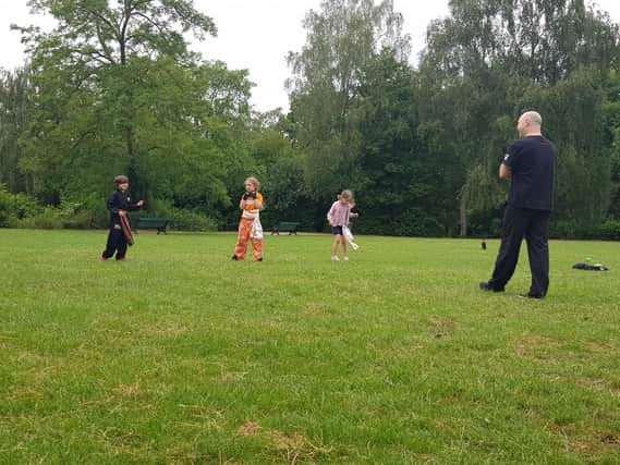 John Kelly of the Wing Chun Kung Fu school in Leamington holds an outdoor class for youngsters at Jephson Gardens.