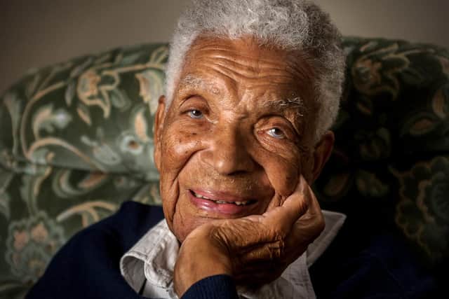 Earl Cameron on his 100th birthday. Photo by Mike Baker.
