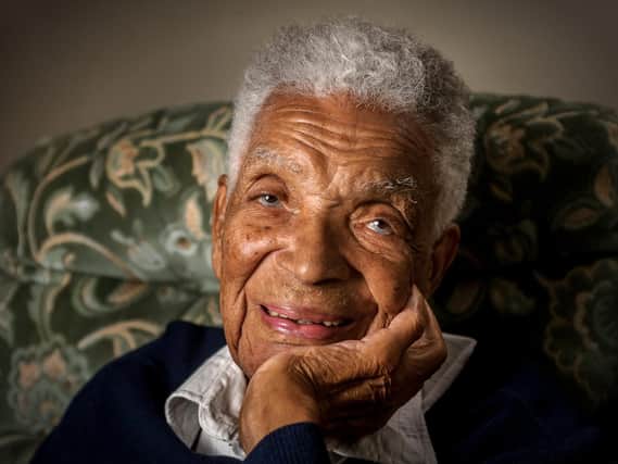 Earl Cameron on his 100th birthday. Photo by Mike Baker.
