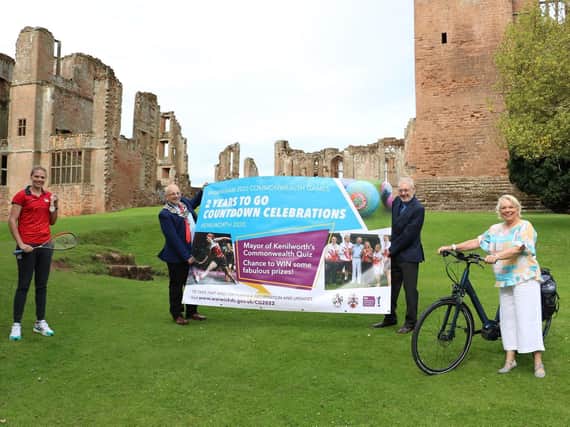 Photographed marking the countdown at Kenilworth Castle are the Mayor of Kenilworth, Councillor Richard Dickson, Chairman of Warwick District Council, Councillor Martyn Ashford, Warwick District Councils Portfolio Holder for Culture, Councillor Moira-Ann Grainger and Commonwealth Games Medallist Sarah-Jane Perry.