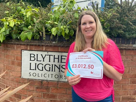 Donna Bothamley at Blythe Liggins with the Myton Hospice cheque.