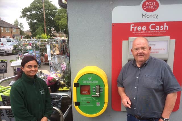 Sukhi ( joint proprietor) with Neil Morris, trustee at Kenilworth HeartSafe. Photo supplied