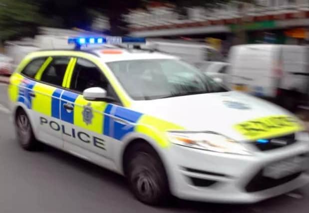 Three people have been arrested and drugs have been seized after policestopped a vehicle in Rugby