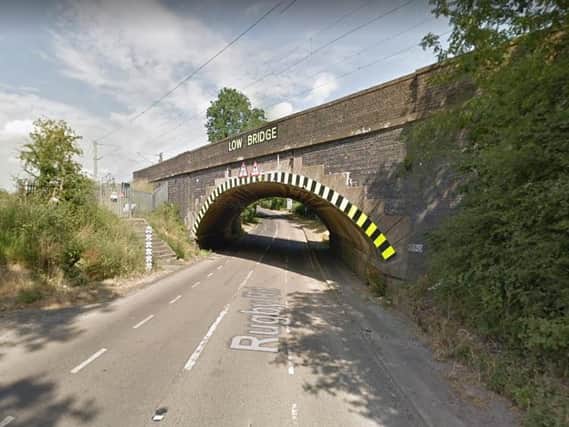 The section of road underneath the bridge appears to be particularly vulnerable to flooding. Photo: Google Streetview.