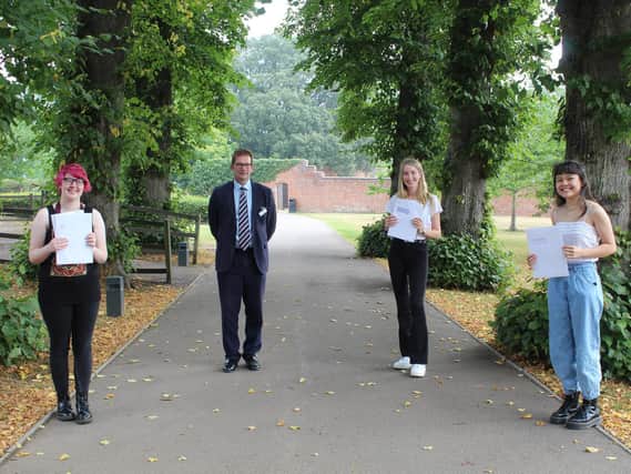 Left to right  Caitlin Mc Bride, Ed Hester - Headmaster, Hannah Porter and Sophie Mitchell.