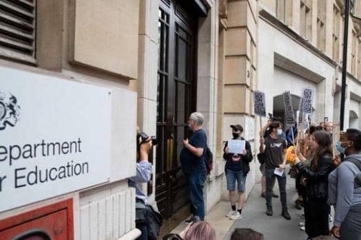Sixth form students protest against the downgrading of A-level results on August 14, 2020 in London, England. (Photo by John Phillips/Getty Images).