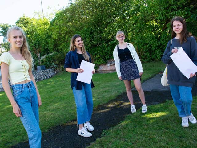 Isabella Fitches, Luana Bodely, Cecilia Goldwin and Molly Locke of The Kingsley School celebrate their GCSE results.