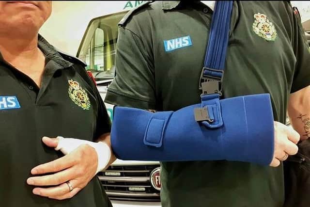 Ambulance staff were attacked in Warwickshire after trying to help a man.