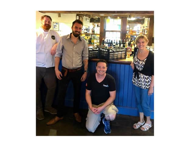 Head chef Mike Scott and general manager Andy Lock with Andy Collins and Pauline Hayward from Covid-19 Kenilworth.