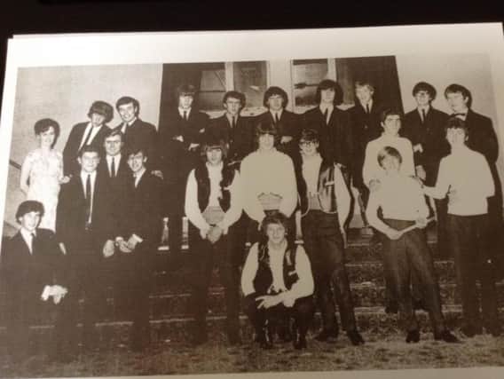 Stu Colman is pictured on the back row, seventh from the left, at the
Granada cinema with other Rugby rockers in 1964.