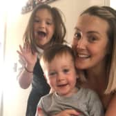 Holly with brother Harry and mum Christina.