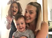 Holly with brother Harry and mum Christina.