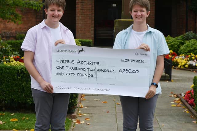 Ellis and Toby Davidson who raised £1,250 by running 500km.
PICTURE: ROB WOODWARD