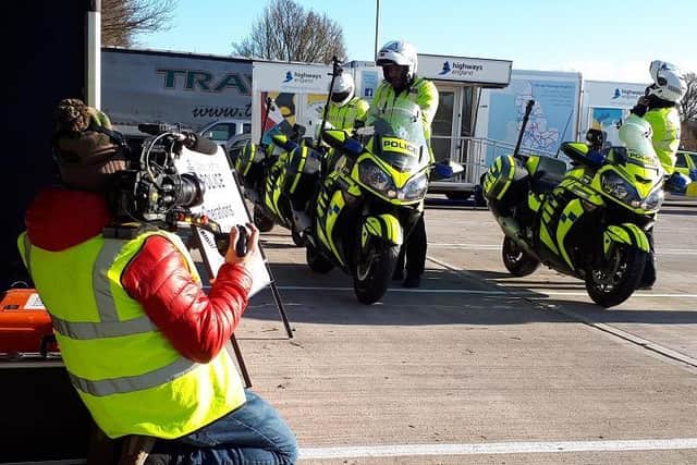 BBC cameraman filming police motorbike riders. Photo supplied by Warwickshire Police