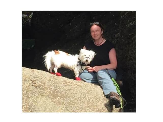 Sarah Richards with her dog Bracket.