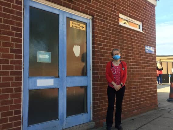 Cancer lead Dr Beth Harrison stands outside the building at St Cross which is to be converted to house the new suite.