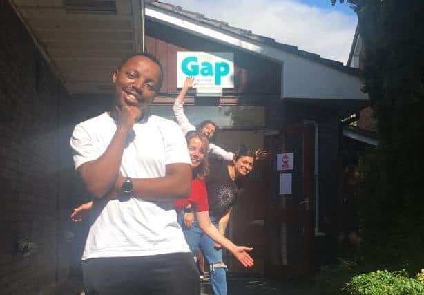 The Gap Youth team, demonstrating their plant pot social distanced queuing system, front to back, Thato Malebye, Jane Lisle-Holmes, Priya Sidhu, and Darius Pourzyaie.  Photo supplied