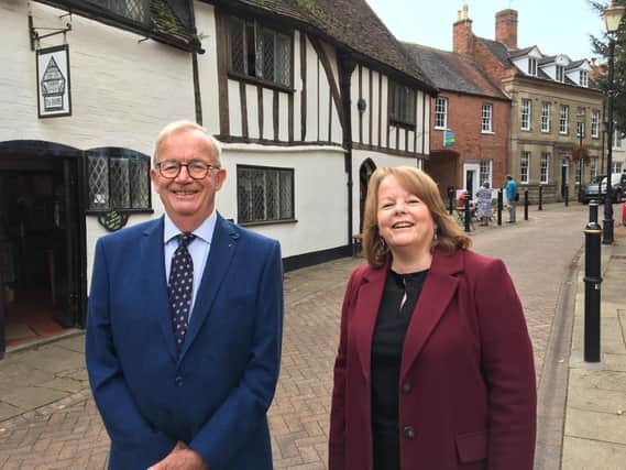 Elaine Johnston, chief executive of the Parenting Project, and Clive Mason, chairman of Warwick charity Thomas Oken and Nicholas Eyffler, in front of Thomas Oken House in Warwick.