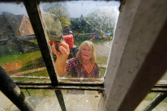 Jeanette McGarry gets to work on the historic Berkswell Windmill.