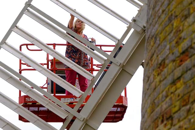 Jeanette McGarry gets to work on the historic Berkswell Windmill.