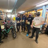 Warwickshire Police and Crime Commissioner handing over copies of the Ultimate Guide to Cycling magazines at John Atkins Cycles in Leamington. Photo supplied