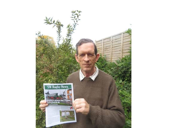 Group convenor Richard Allanach with a copy of the leaflet.