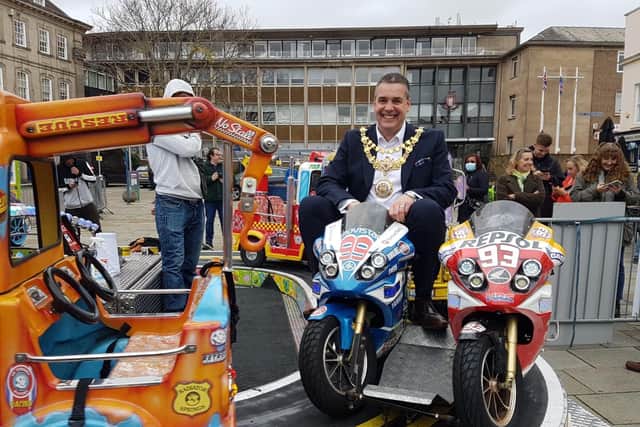 Cllr Terry Morris, Mayor of Warwick, on one of the few rides that were set up in the town. Photo supplied