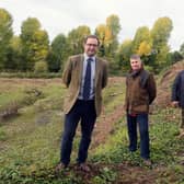 Pictured on the site are, from left to right, James Davies, Mike Vining and Robert Wigley, chairman of The Wigley Group.