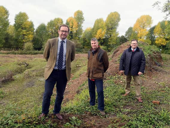 Pictured on the site are, from left to right, James Davies, Mike Vining and Robert Wigley, chairman of The Wigley Group.