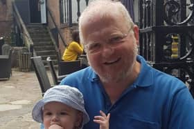 Dave Evans with his grandson. Photo supplied
