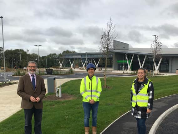 Rugby MP Mark Pawsey, Alexandra Purcarea (site operations manager) and Wendy Corcoran-Smith (project manager) at the Moto Service Site near J1 of the M6.