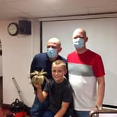 From left: Father and son, Michael and Harry Horton, and family friend, Warren Nicholl, took part in the 'Brave the Shave' challenge on Sunday November 1 in Kineton to benefit Macmillan Cancer Support