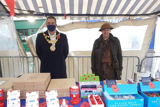 Cllr Terry Morris, Mayor of Warwick, at the Warwick Branch of the Royal British Legion's stall at Warwick market. Photo supplied