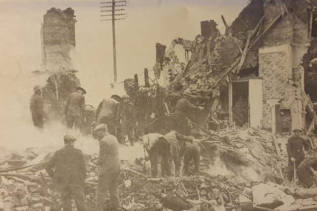 Rescuers toil through the rubble to reach victims of a landmine explosion in Kenilworth.
