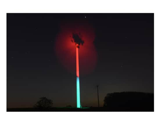 A 410ft wind turbine at Swinford Wind Farm has been turned into a giant poppy ahead of Remembrance Sunday.