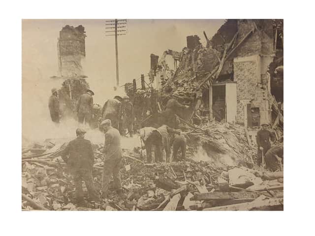 Rescuers toil through heaps of rubble to reach victims of a landmine explosion in Kenilworth.