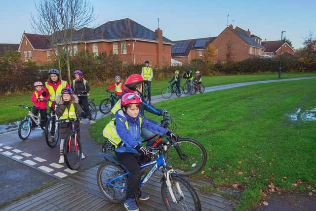 Youngsters on the Bicycle Bus raised money for Children in Need.