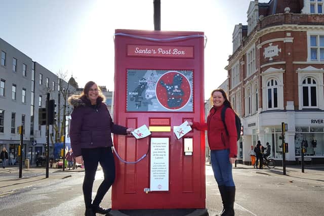 Stephanie Kerr (right) and Alison Shaw, both from BID Leamington, at Santa’s Post Box.