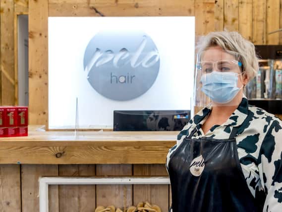 Claire Burns-Jackson in her PPE gear at her salon, Pelo, in Warwick Gates.